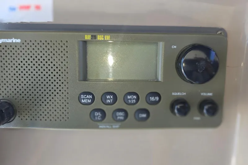 Raymarine radio system on 2005 Sea Ray 340 Sundancer boat dashboard.