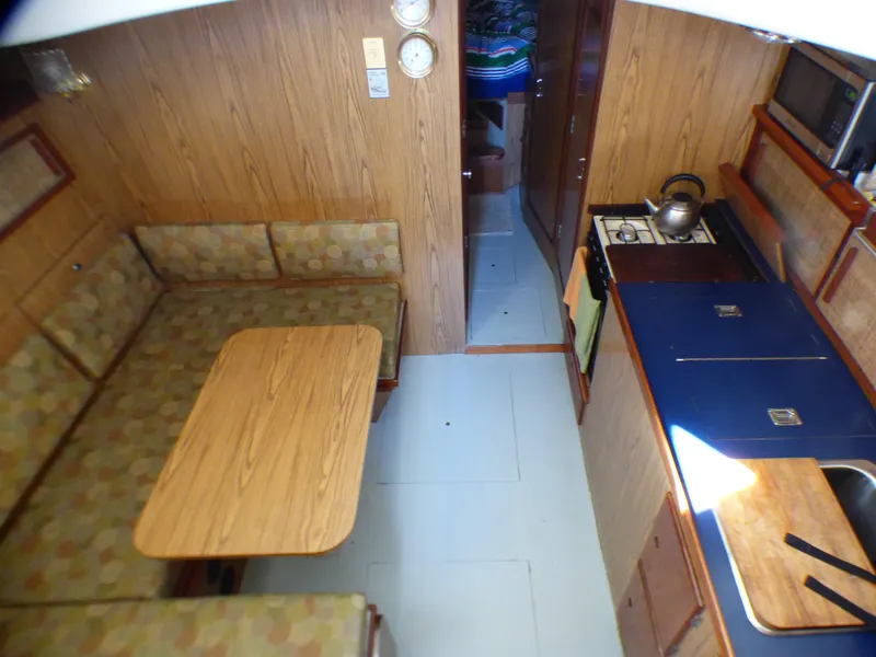 Dinette to Port, Galley to Starboard