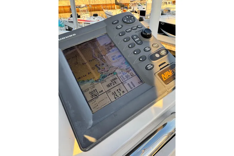 Navigation system on a 1998 Luhrs Tournament 320 Convertible boat, displaying a nautical map.