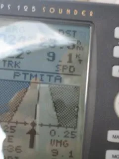 Close-up of a GPS 125 Sounder display on a 1973 CAL 246 boat.