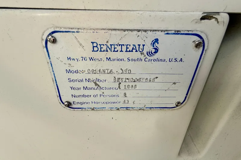 Plaque of 1988 Beneteau Oceanis 390 with specifications and serial number.