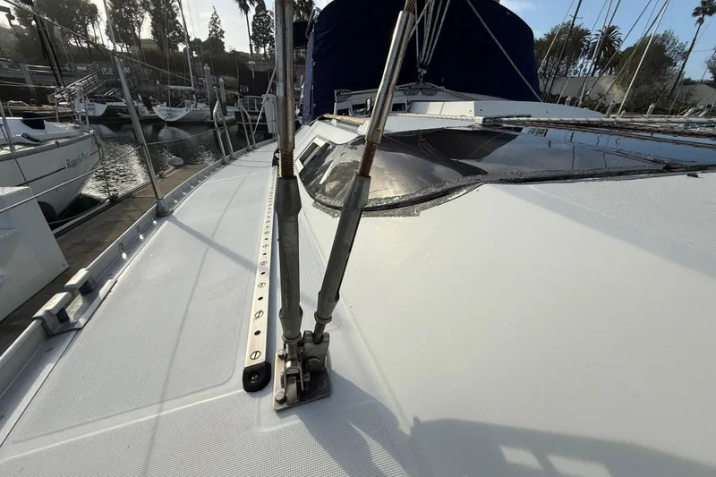 1988 Beneteau Oceanis 390 sailboat deck view in marina setting.