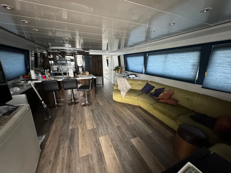Luxurious interior of 1990 Versilcraft Challenger Motor Yacht with modern furnishings and spacious layout.
