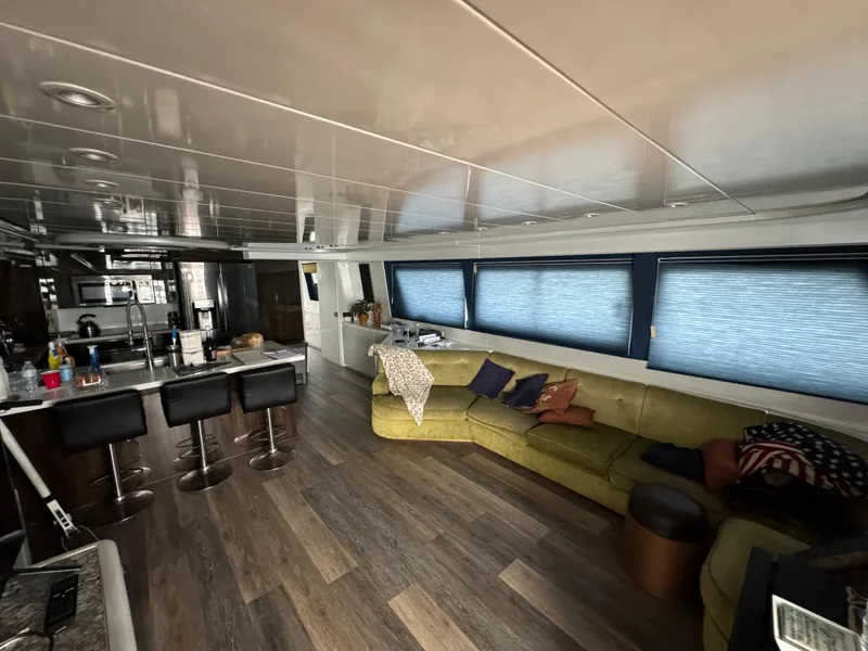 Luxurious interior of 1990 Versilcraft Challenger Motor Yacht with modern furnishings and spacious layout.