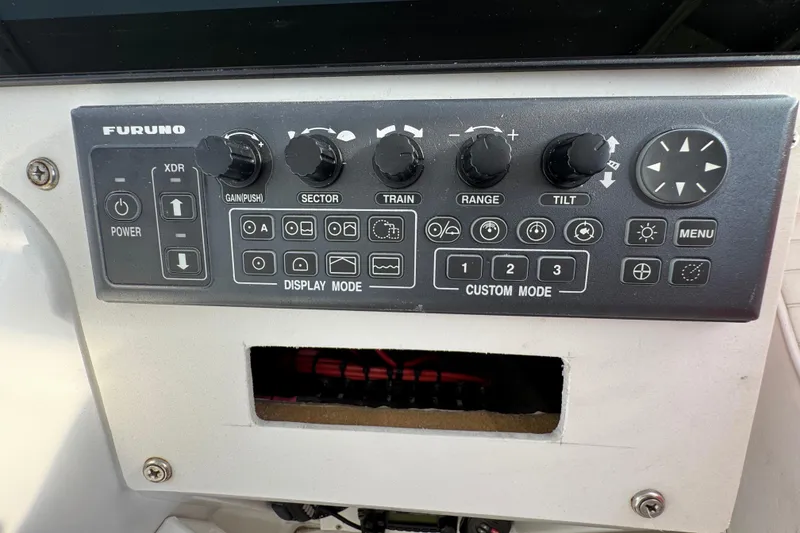 Control panel of a 1984 Blackfin 32 Flybridge boat with Furuno navigation system.