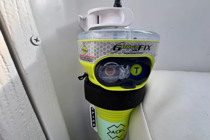 EPIRB device on 1984 Blackfin 32 Flybridge, featuring GlobalFix V4 GPS satellite technology.