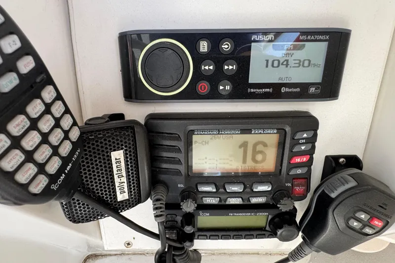 Control panel of a 1984 Blackfin 32 Flybridge with radio and communication devices.