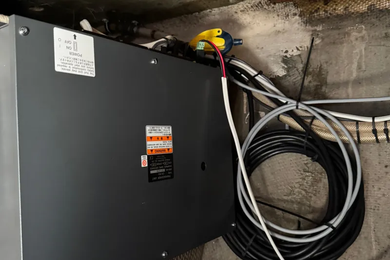 Electrical panel and wiring inside a 1984 Blackfin 32 Flybridge boat.