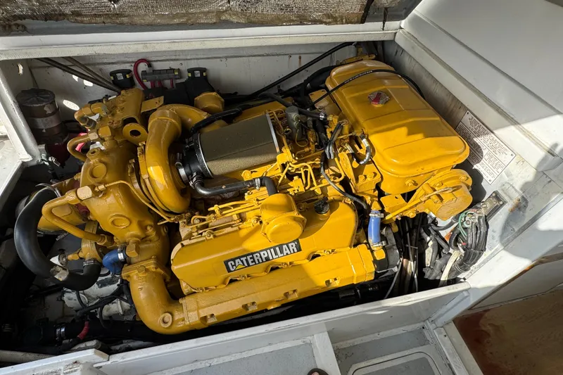 Engine compartment of 1984 Blackfin 32 Flybridge with Caterpillar engine.