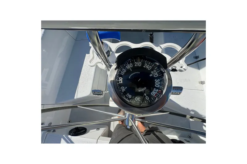 Compass on 1997 Catalina 36 MkII sailboat cockpit, showing navigation details.