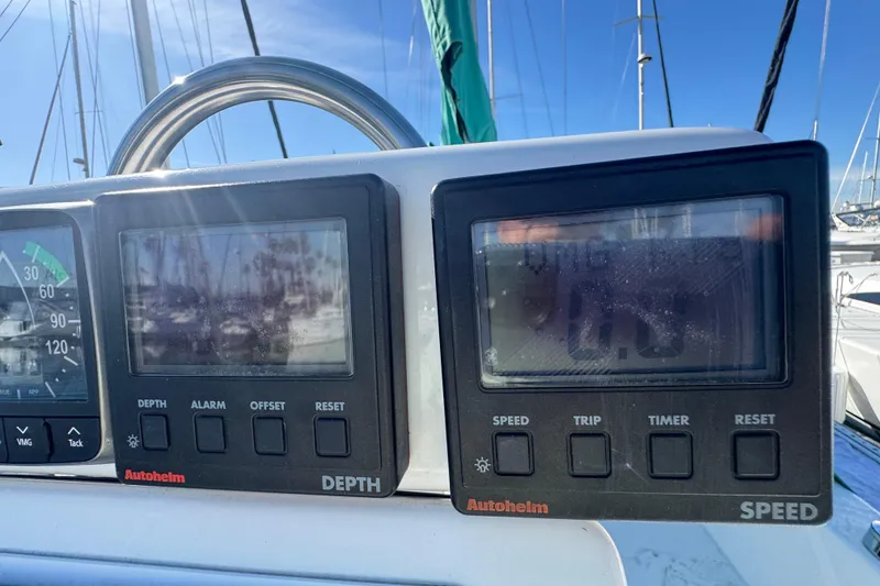 Autopilot and speed instruments on a 1997 Catalina 36 MkII sailboat dashboard.