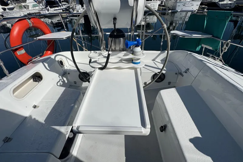 Cockpit of 1997 Catalina 36 MkII sailboat with steering wheel and safety equipment.