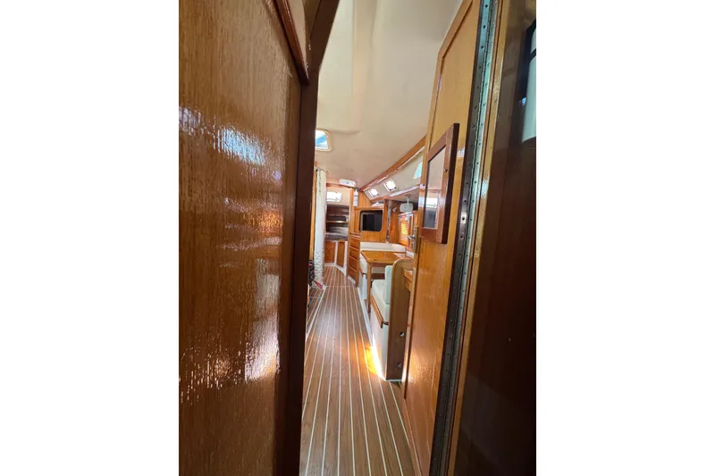Interior view of 1997 Catalina 36 MkII sailboat with polished wood finish.