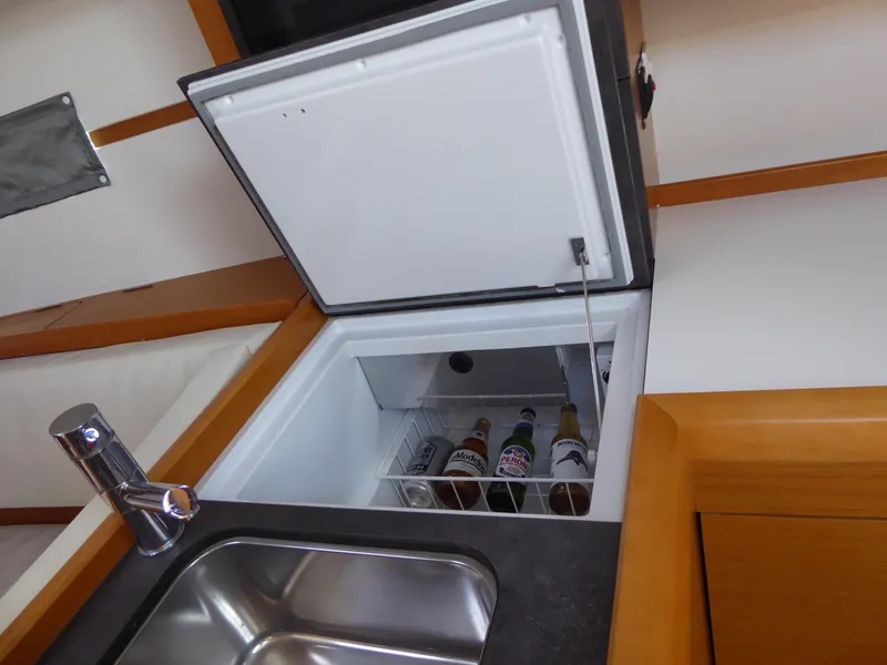 Top loading refrigerator