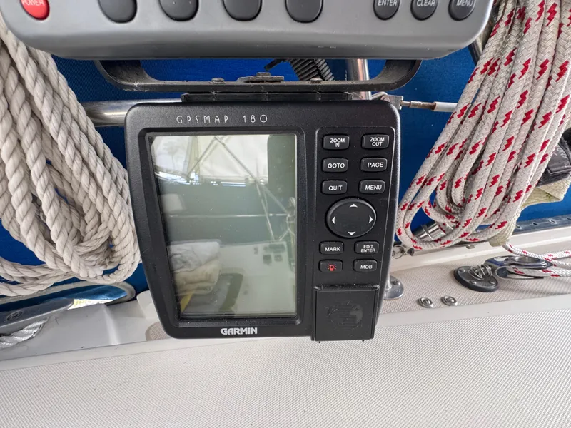 Garmin GPSMAP 180 on 1985 Catalina 36 MK1 sailboat with ropes and controls.