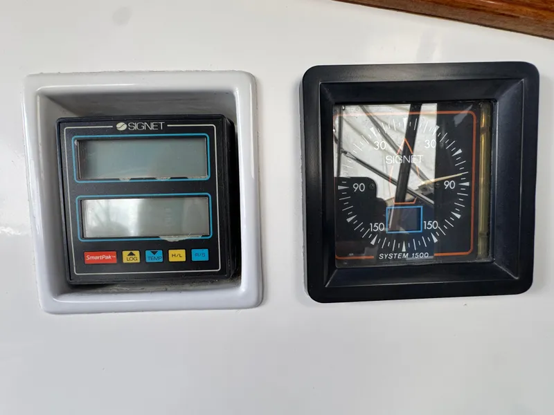 Signet marine instruments on a 1985 Catalina 36 MK1 sailboat dashboard.