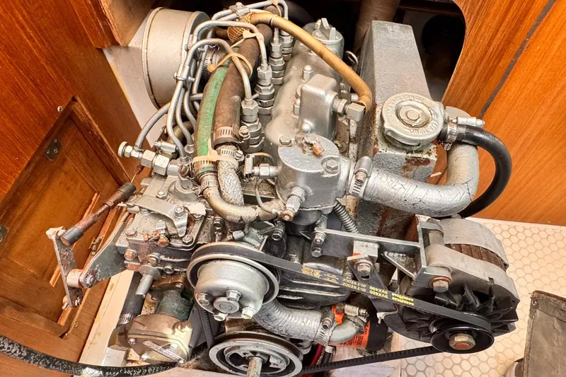 Engine of a 1995 Catalina 36 MkII sailboat, showcasing intricate mechanical components.