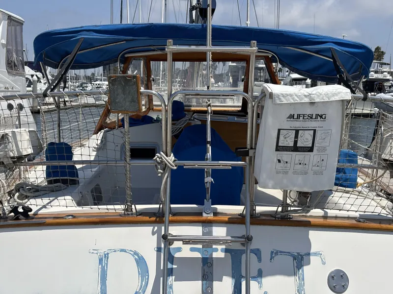 Sailboat Norseman 447, 1982 model, docked with Lifesling safety equipment visible.