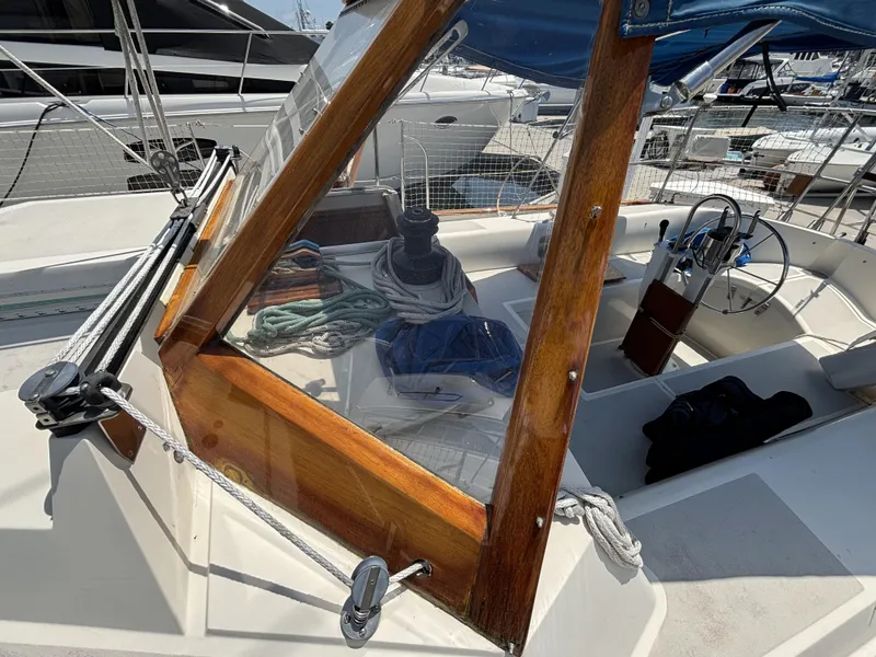 Cockpit of 1982 Norseman 447 sailboat with wooden trim and nautical equipment.