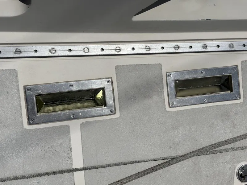 Alt text: "1982 Norseman 447 deck with metal fittings and rail."