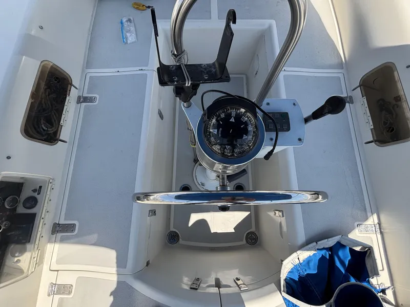 Cockpit of 1982 Norseman 447 sailboat with steering wheel and compass.