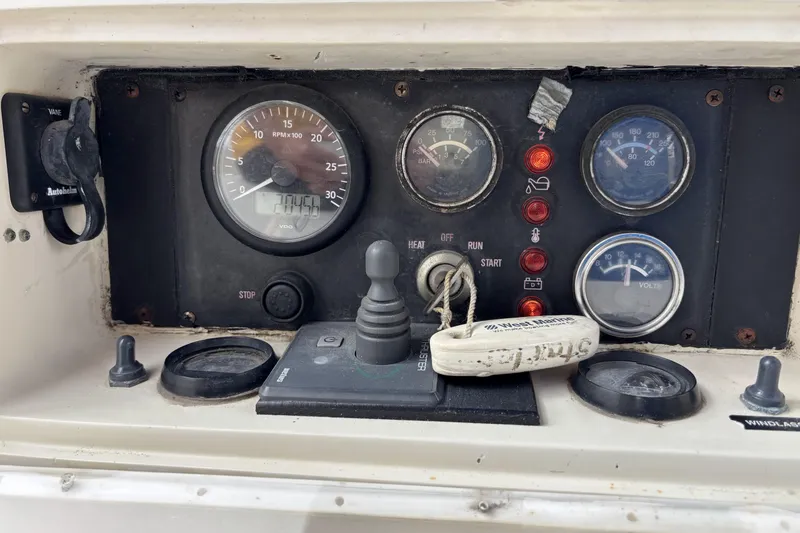 Control panel of a 1982 Norseman 447 boat with gauges and switches.