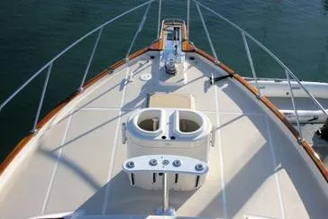 1990 Offshore Yachts 55 Pilothouse bow with railing and deck details.