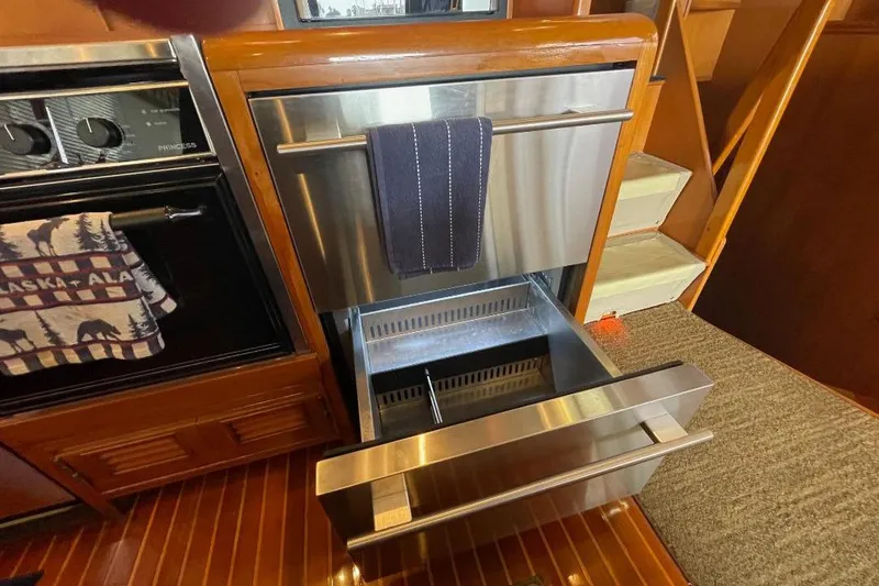 Stainless steel drawer in 1990 Offshore Yachts 55 Pilothouse kitchen interior.