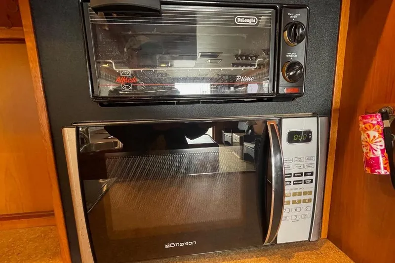 Toaster oven and microwave in 1990 Offshore Yachts 55 Pilothouse kitchen.