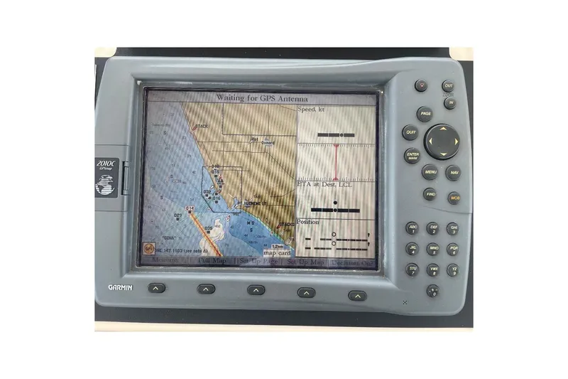 Garmin GPS navigation system on 1990 Offshore Yachts 55 Pilothouse, displaying coastal map.