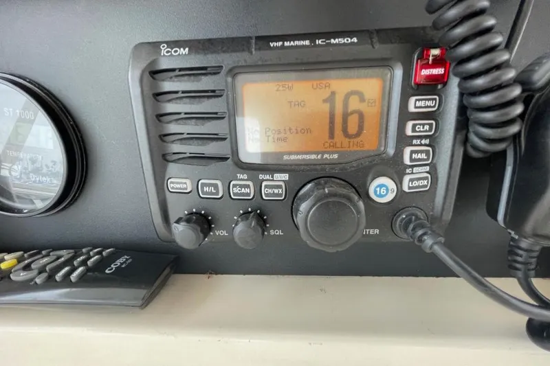 VHF marine radio on 1990 Offshore Yachts 55 Pilothouse, channel 16 active.