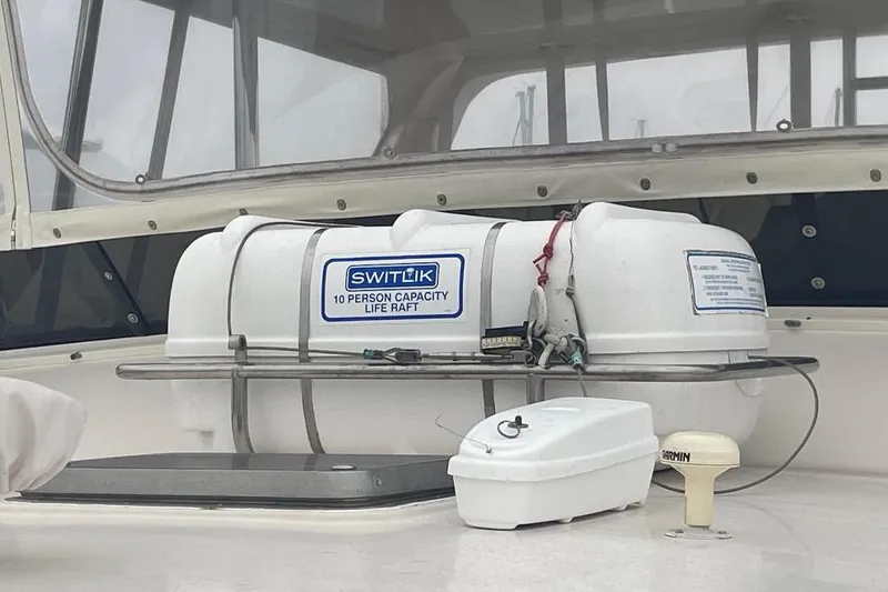 Life raft on 1990 Offshore Yachts 55 Pilothouse, 10-person capacity, Switlik brand.