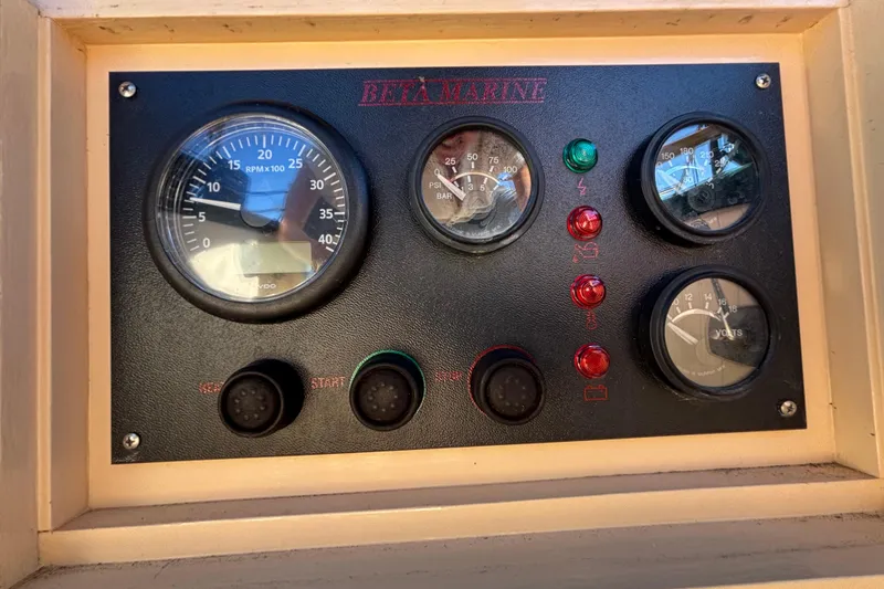 Instrument panel of a 1983 Bristol Channel Cutter 28 with gauges and indicators.