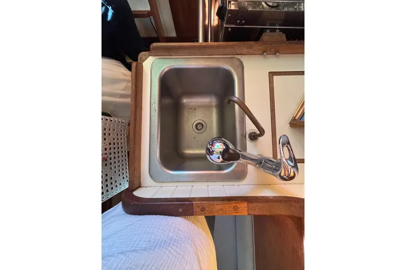 Stainless steel sink in 1983 Bristol Channel Cutter 28 boat galley.