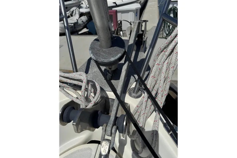 Close-up of 1989 Gulf Pilot House sailboat rigging and ropes on deck.