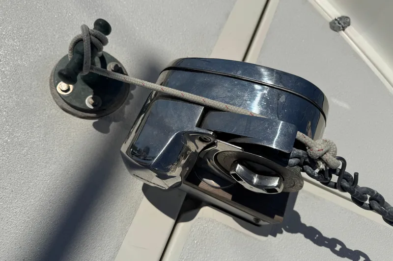 Chrome winch and rope on 1989 Gulf Pilot House boat deck.