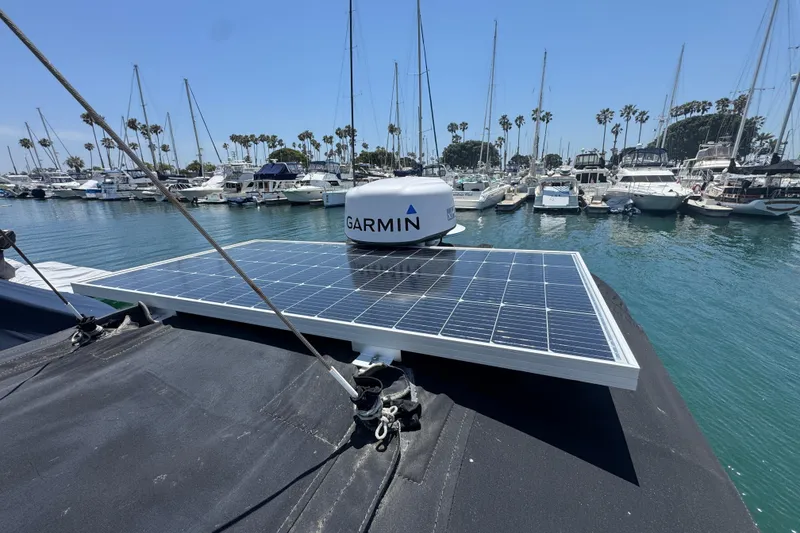 1989 Gulf Pilot House with solar panel and Garmin radar in a marina.