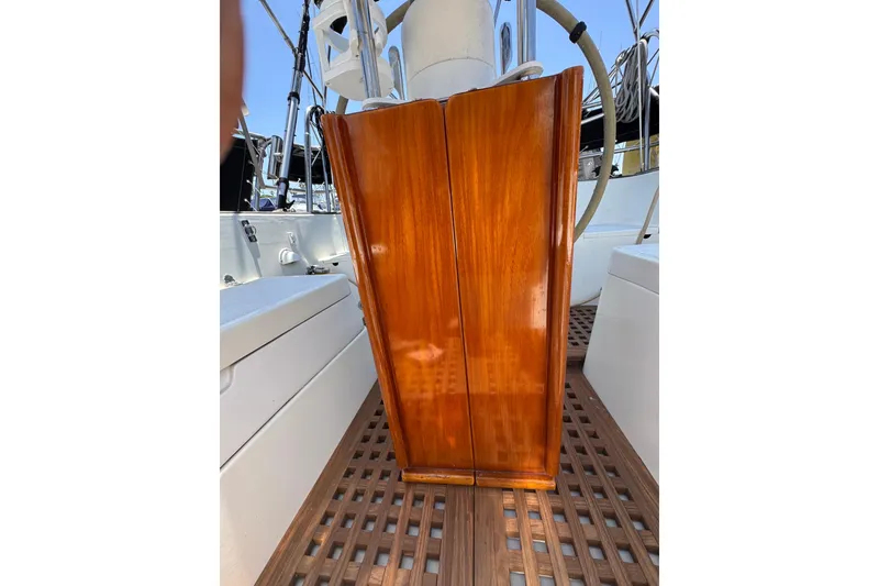 Polished wooden panel on 1989 Gulf Pilot House boat deck.