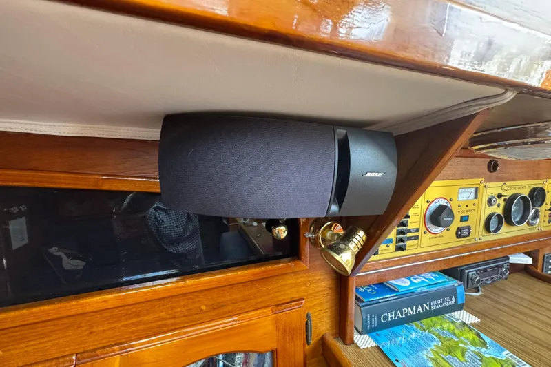 1989 Gulf Pilot House interior with Bose speaker and navigation instruments.