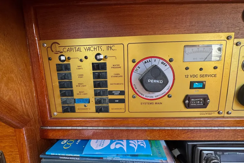 Electrical control panel of a 1989 Gulf Pilot House yacht by Capital Yachts, Inc.