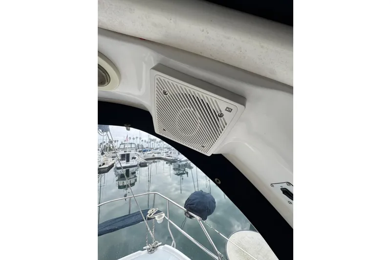 Speaker on 1999 Hunter Passage 420 sailboat with marina view in background.