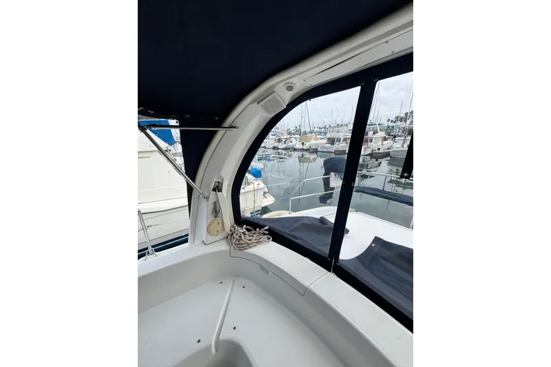 Interior view of 1999 Hunter Passage 420 sailboat in marina setting.