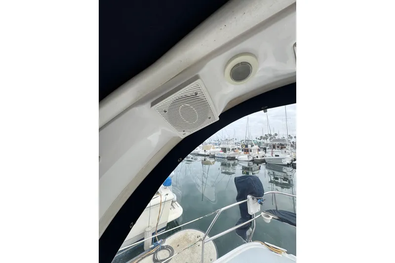 1999 Hunter Passage 420 sailboat interior with marina view, featuring speaker and light.