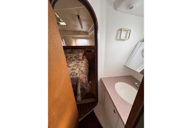 Interior of 1999 Hunter Passage 420 yacht showing cabin and bathroom area.