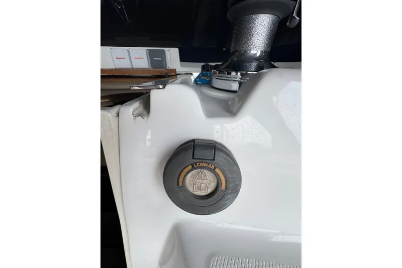 Close-up of a 1999 Hunter Passage 420 boat component with a Lewmar winch.