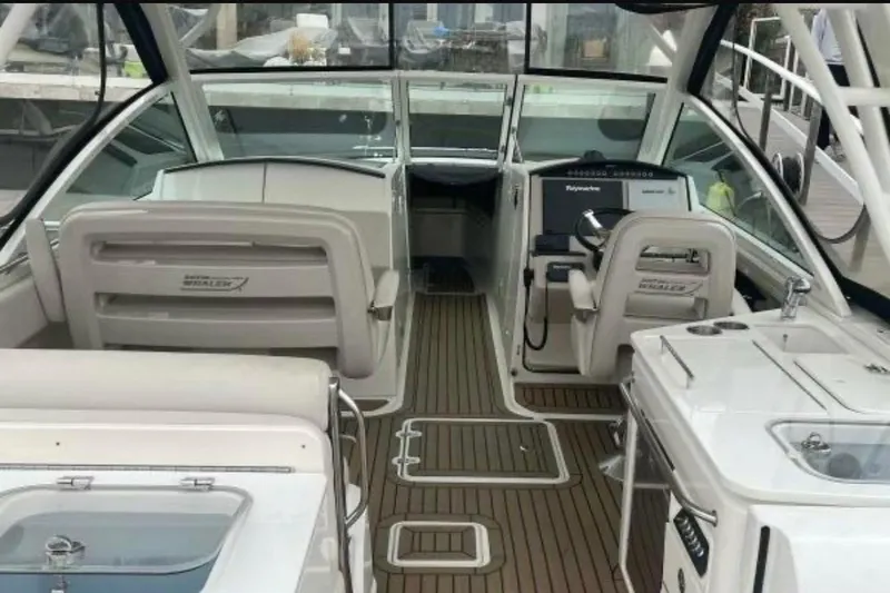 2018 Boston Whaler 320 Vantage interior with helm, seating, and modern controls.