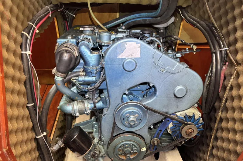 Engine of a 1997 Beneteau Oceanis 400 sailboat, showcasing mechanical components.