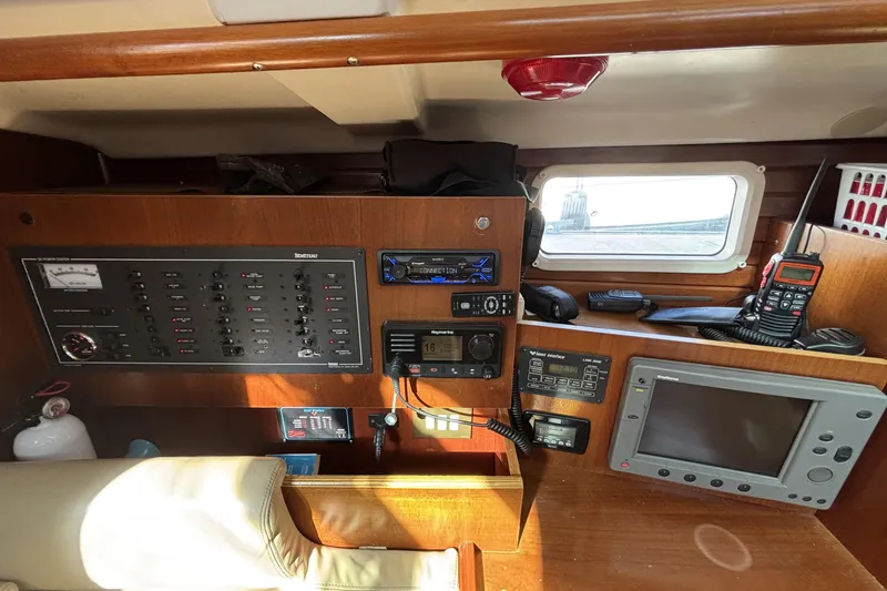 Interior view of a 1997 Beneteau Oceanis 400 yacht's navigation and control panel.