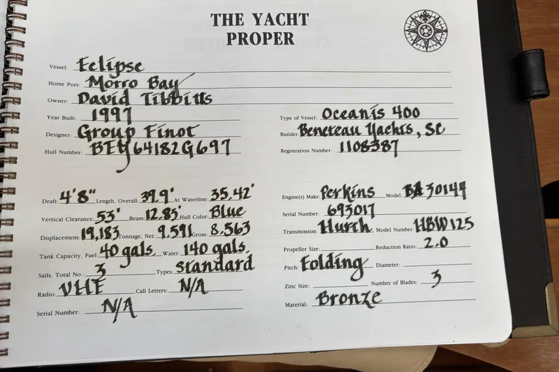 Notebook page detailing specifications of a 1997 Beneteau Oceanis 400 yacht.