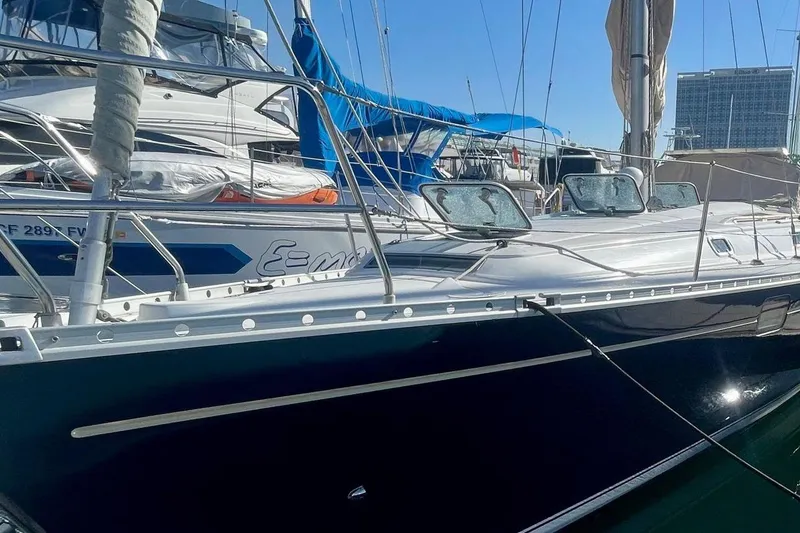 1997 Beneteau Oceanis 400 sailboat docked in marina, side view.